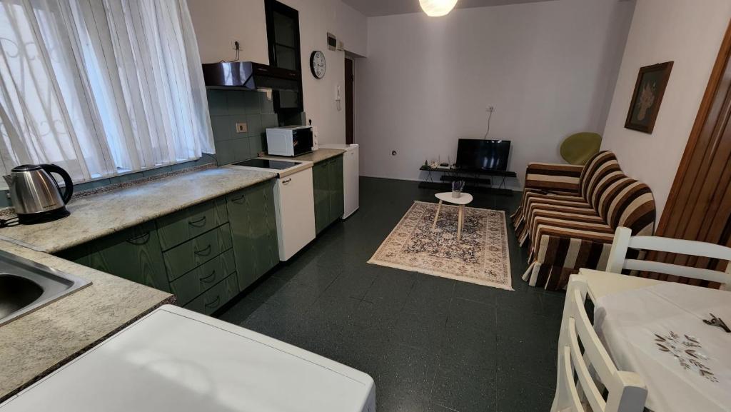 Tirana Mosaic bathroom luxury amenities apartment Albania